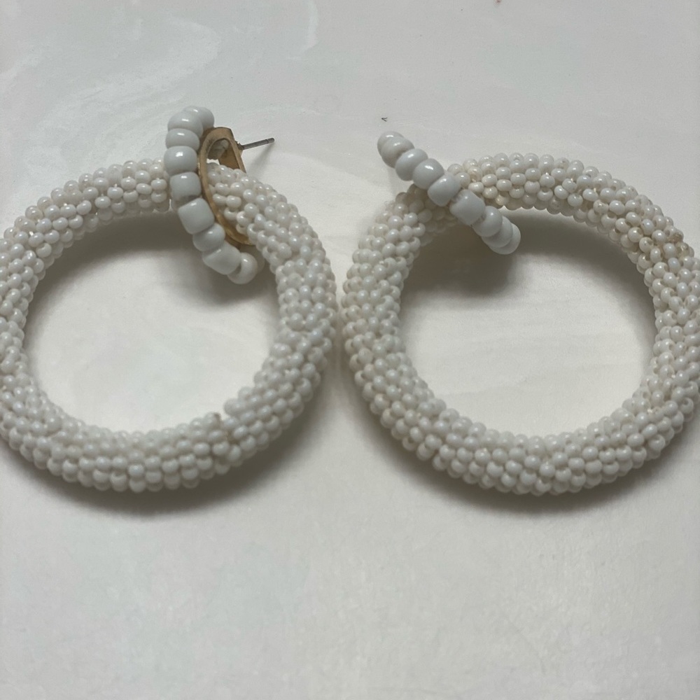 White beaded circle earrings